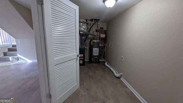 utility room with water heater