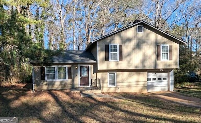 split level home featuring a garage