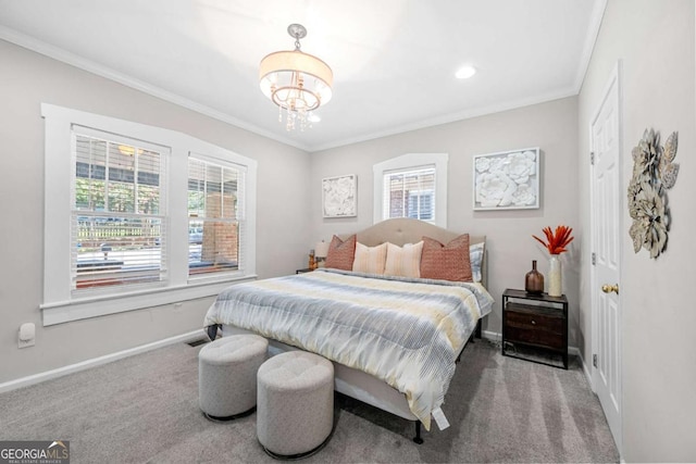 bedroom featuring a chandelier, carpet floors, and ornamental molding