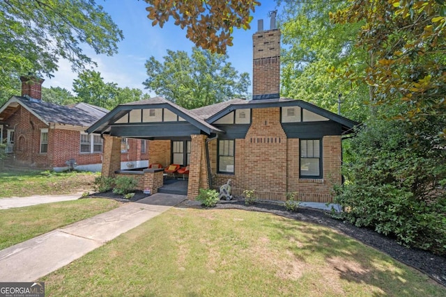 view of front of home with a front lawn