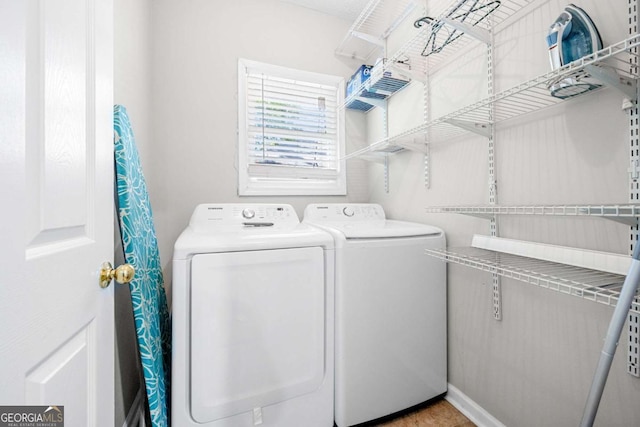 washroom featuring independent washer and dryer