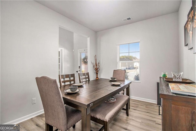 dining room featuring light wood-type flooring