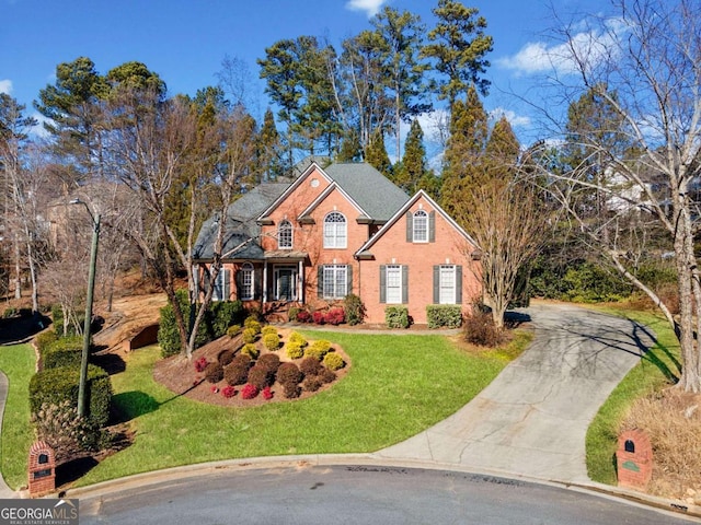 view of front property with a front lawn