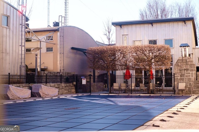 exterior space featuring a community pool