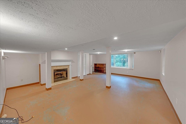 unfurnished living room with a fireplace, light wood-type flooring, and ceiling fan