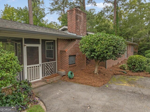 unfurnished room with ceiling fan, hardwood / wood-style floors, and ornamental molding