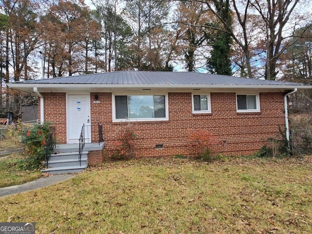 view of front of house with a front lawn