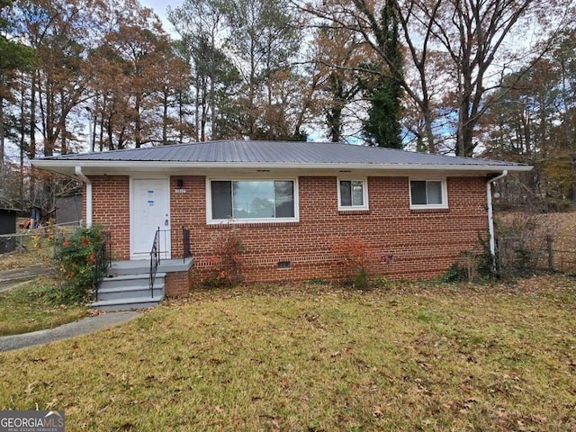 view of front facade featuring a front yard