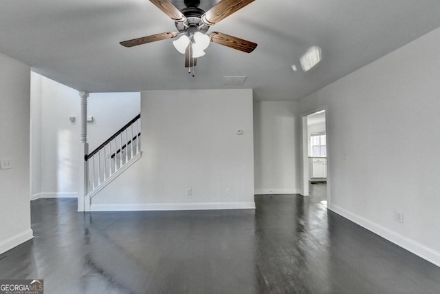 spare room featuring ceiling fan