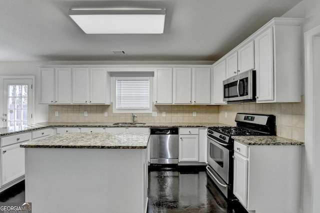 kitchen featuring white cabinets and stainless steel appliances