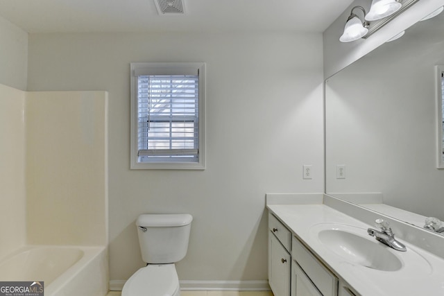 full bathroom featuring shower / bathing tub combination, vanity, and toilet