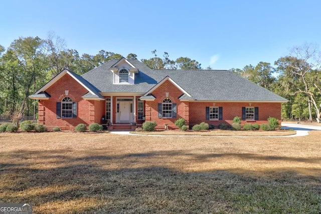 view of front of home with a front yard