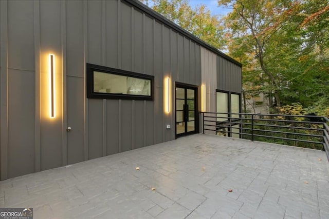 view of side of property featuring a balcony