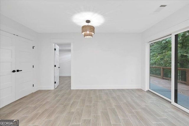 empty room featuring light hardwood / wood-style floors