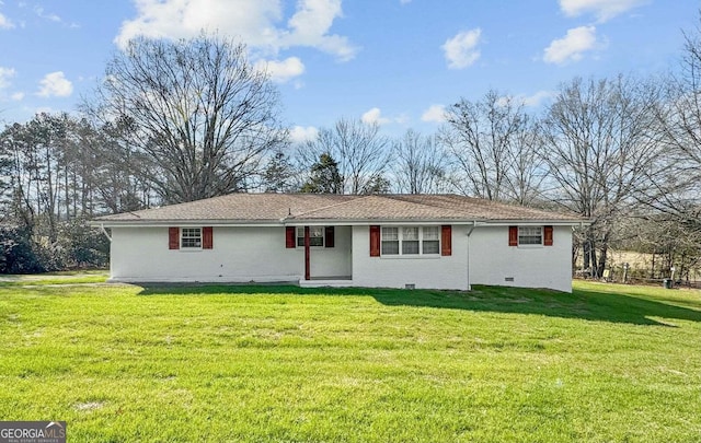 ranch-style house with a front lawn