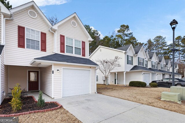 front of property featuring a garage