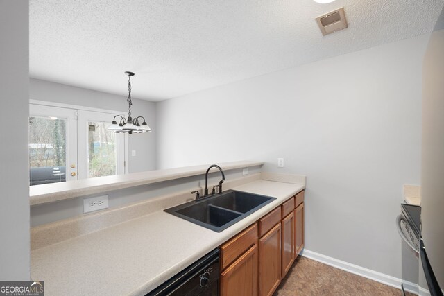 bathroom with vanity and a textured ceiling