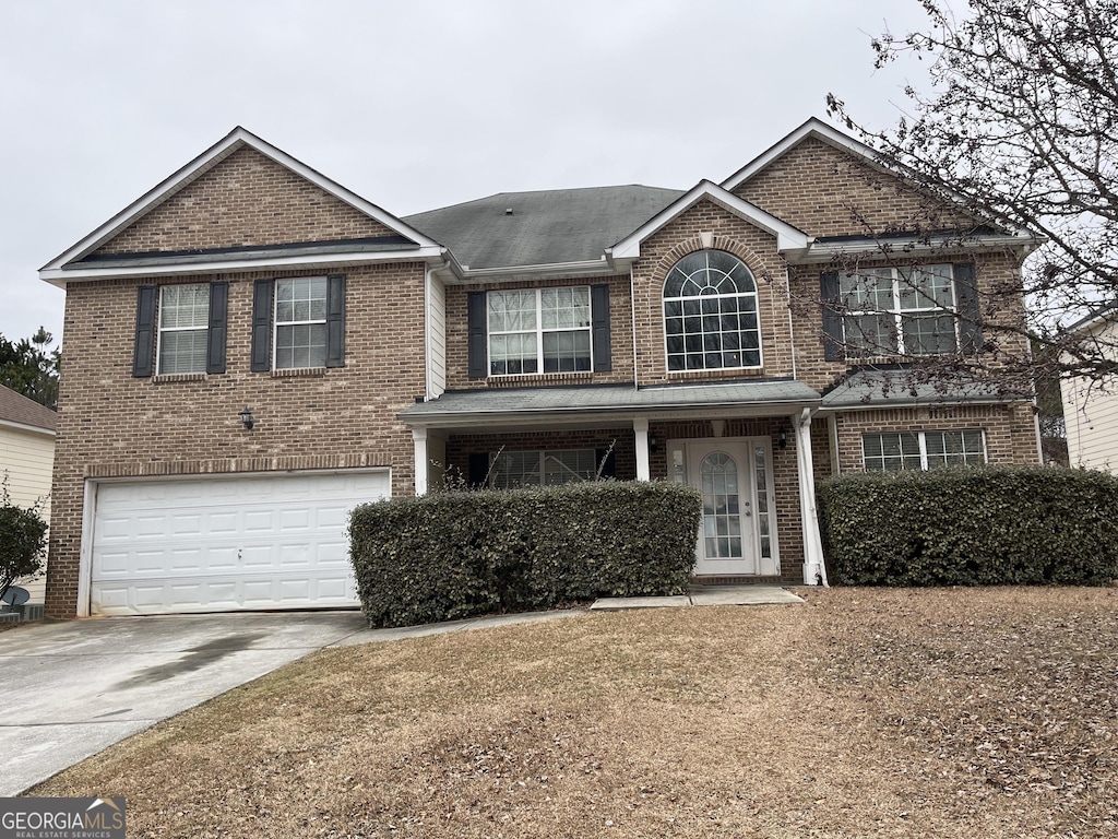 front facade with a garage