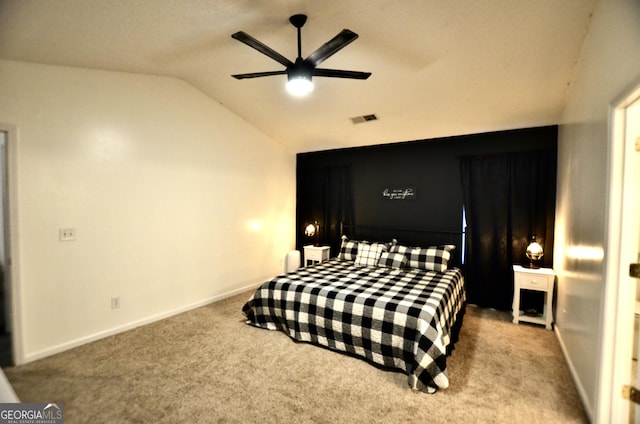 carpeted bedroom featuring ceiling fan and lofted ceiling