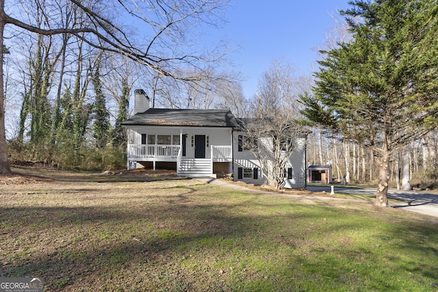 view of front of property with a front lawn