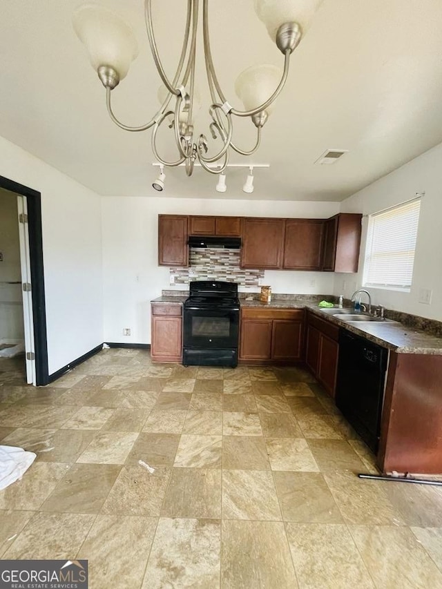 kitchen featuring sink, an inviting chandelier, range hood, decorative light fixtures, and black appliances