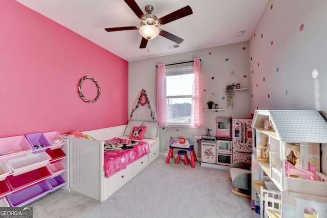 bedroom featuring ceiling fan and light carpet