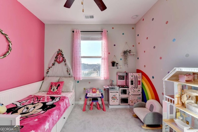 carpeted bedroom featuring ceiling fan