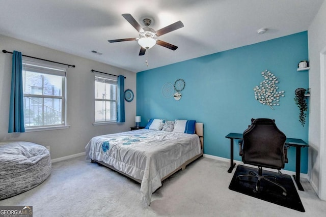 bedroom featuring ceiling fan and carpet floors