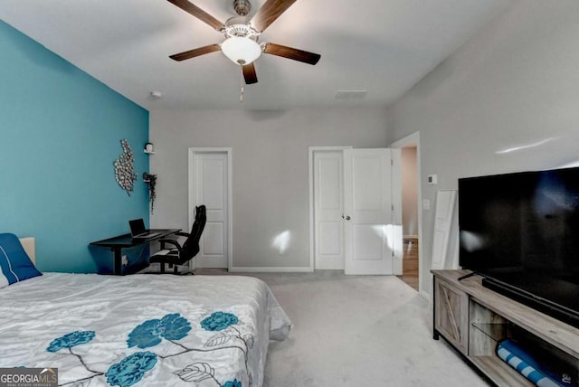 carpeted bedroom with ceiling fan