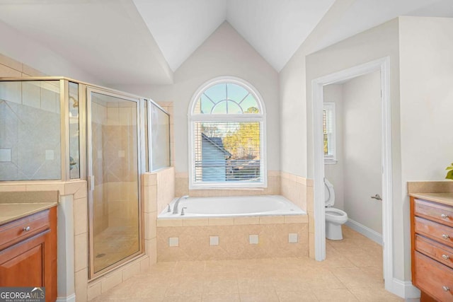 full bathroom featuring vanity, separate shower and tub, tile patterned flooring, toilet, and lofted ceiling