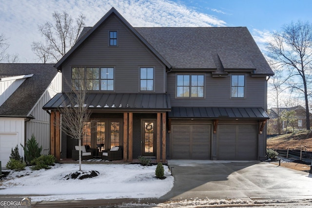 view of front of property with a garage