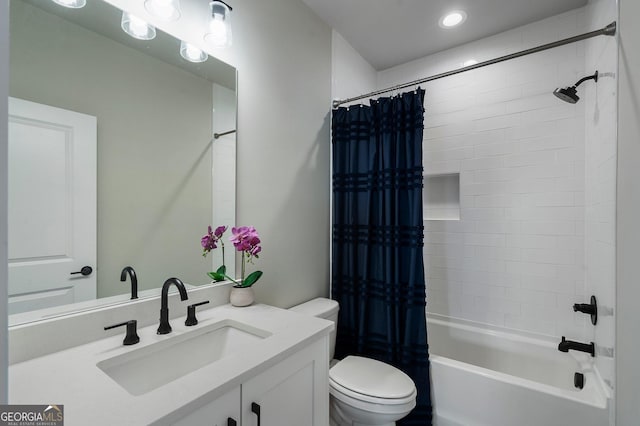 full bathroom with toilet, vanity, and shower / bath combo with shower curtain