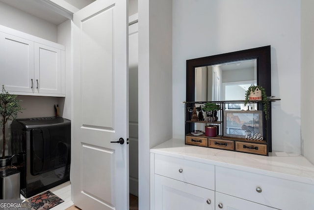 interior space with washer / clothes dryer and vanity