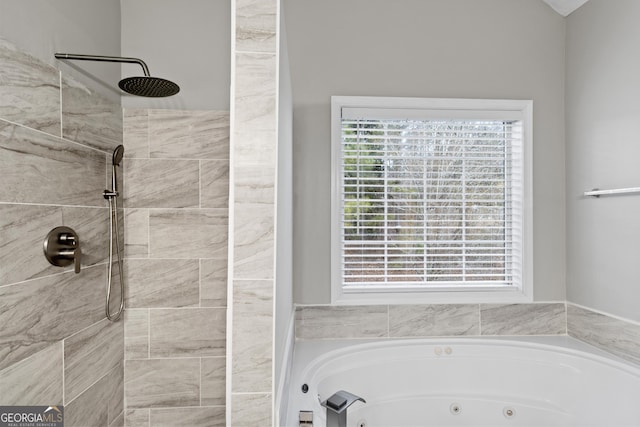 bathroom featuring separate shower and tub