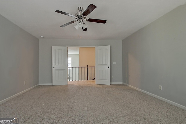 spare room featuring ceiling fan