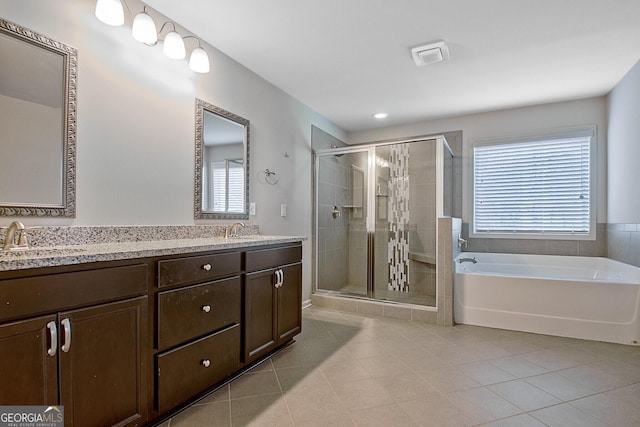 bathroom with vanity, separate shower and tub, and tile patterned floors