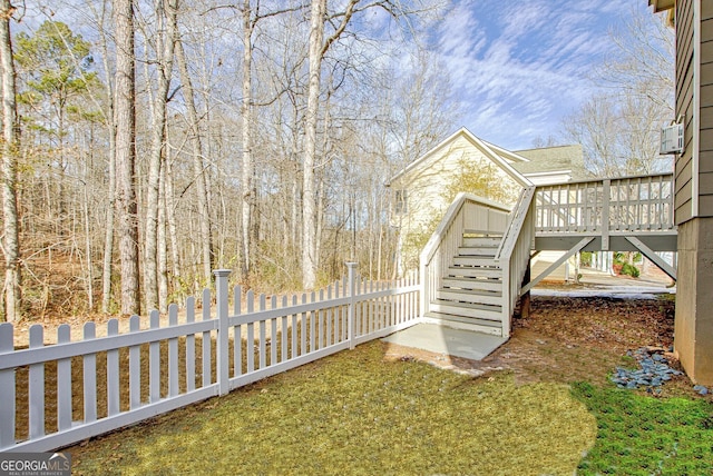 view of yard featuring a wooden deck