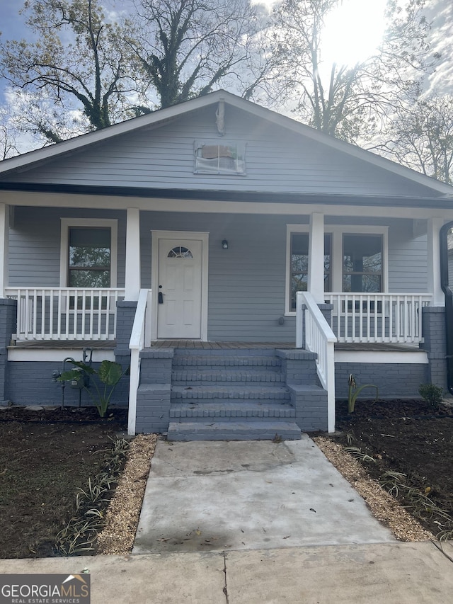 bungalow-style house with a porch