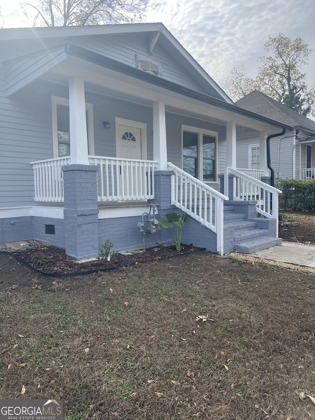 bungalow-style home featuring a porch