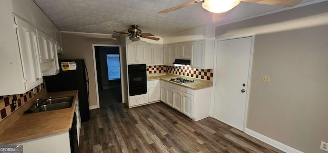 kitchen with tasteful backsplash, a textured ceiling, white cabinets, oven, and stainless steel gas stovetop