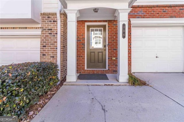 property entrance with a garage