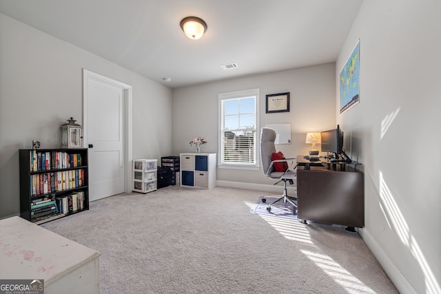 view of carpeted office space