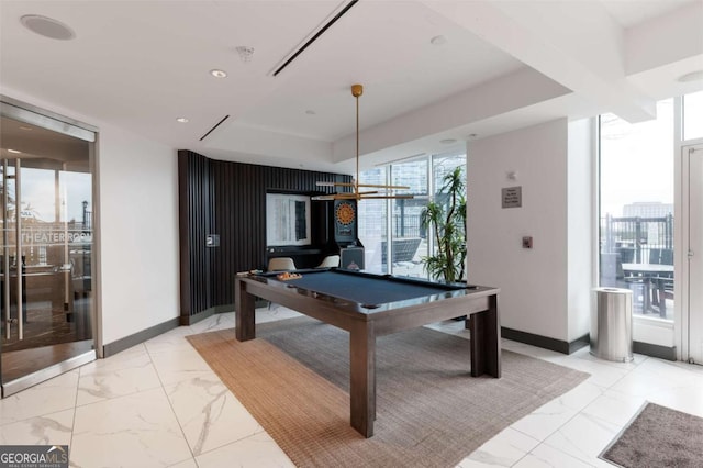 rec room featuring floor to ceiling windows and billiards