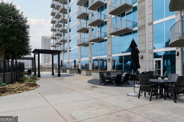 view of home's community featuring a pergola