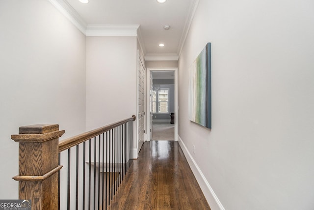 hall with crown molding and dark wood-type flooring