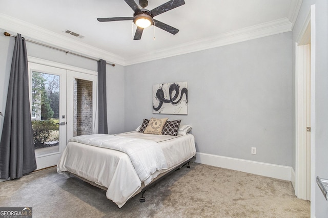 bedroom with ornamental molding, carpet flooring, ceiling fan, and french doors