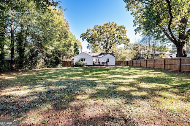 view of yard with a deck