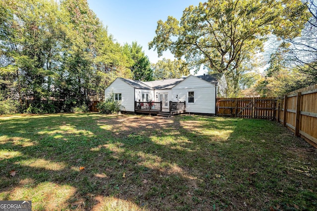 view of yard with a deck