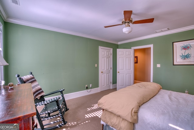 bedroom with ceiling fan, carpet flooring, visible vents, baseboards, and crown molding