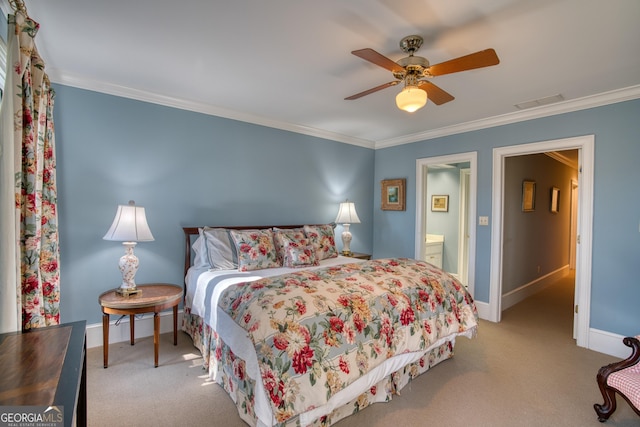 carpeted bedroom with ceiling fan, ornamental molding, connected bathroom, and baseboards